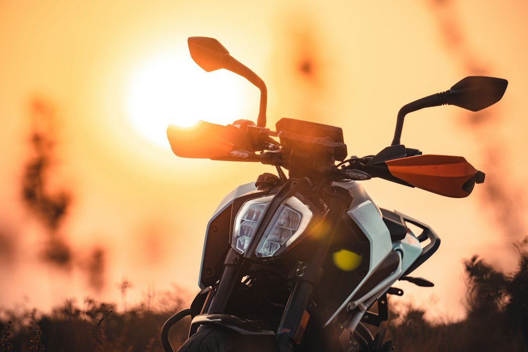 black and yellow motorcycle during sunset