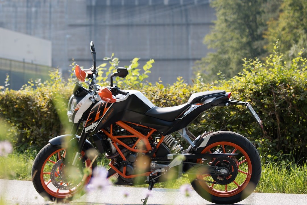 black and orange sports bike