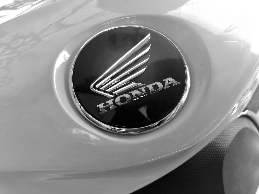 white and black Honda logo